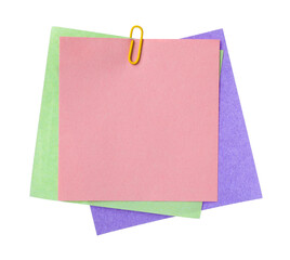 Blank paper notes attached with clip isolated on white