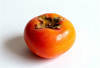 Ripe Persimmon Fruit on White Background in Close-Up(generated by AI)