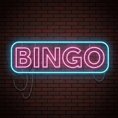 Obraz premium A neon sign on a brick wall illuminates the word 