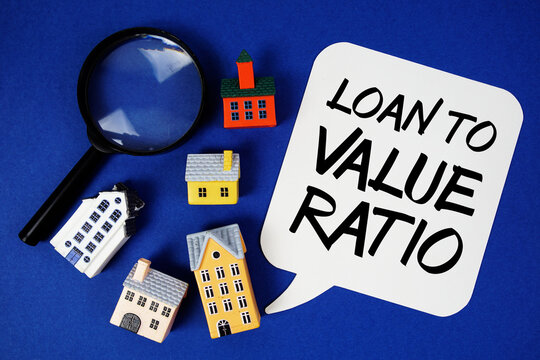 LTV Loan-to-Value Ratio text with house models and magnifying glass on blue background - Powered by Adobe