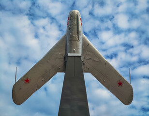 old Russian military fighter jet flies in the sky