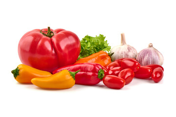 Ripe Tomato with Peppers, Garlic and Lettuce, isolated on white background