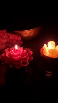 candle and rose petals