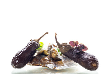 ready-to-freeze eggplants in a vacuum bag on a white background