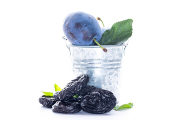 Juicy exotic plums and fresh dried prunes macro shot