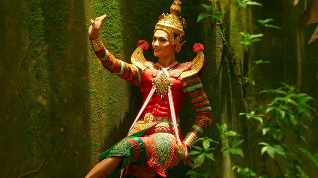 
Southern Thai Nora dancers showcase elegant poses under the soft light filtering through the rubber plantation, blending nature&rsquo;s serenity with the rhythm and beauty of traditional performing arts.