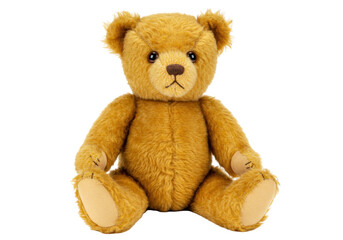 Isolated golden-brown teddy bear with tan paws sitting up on a soft surface, cute stuffed toy