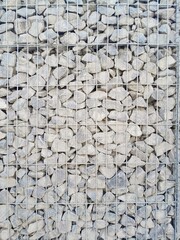 Grey stones in Gabion Wall, Baskets, wire fence filled with stones
