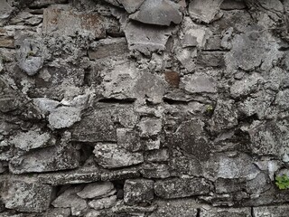 Background of very old stone wall texture photo