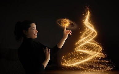 Smiling woman creating glowing Christmas tree with magical touch