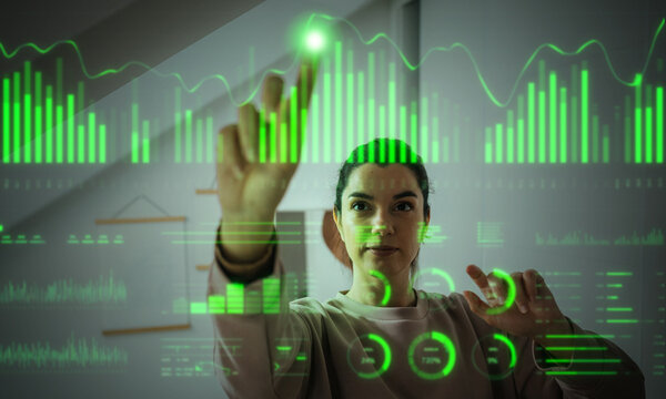 Woman analyzing interactive financial data on virtual green interface - Powered by Adobe
