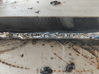 Porosity or Cluster Porosity in Welded, Defect of Welding with Process Flux Cored Arc Welding (FCAW).