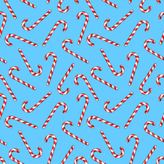 Festive Christmas Seamless Pattern: Playful Red-and-White Candy Canes Scattered on Vibrant Sky Blue Background for Whimsical Holiday Cheer