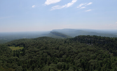 scenic view of shawangunk ridge mountain hazy landscape from mohonk preserve sky top tower hiking trail beautiful blue hills glacial rock