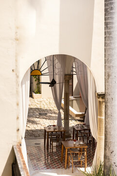 High angle view looking down at breakfast tables in traditional courtyard in Merida, Mexico