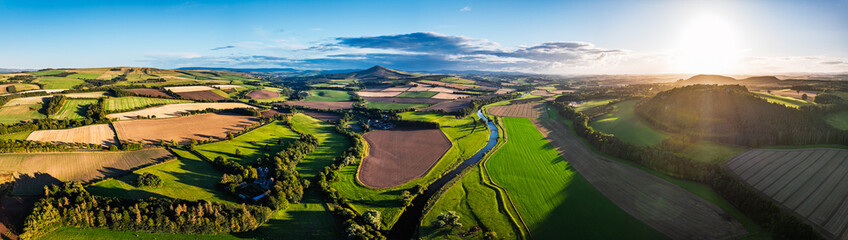Panorama of Fields and Farms over River Teviot and Minto Crags from a drone, Roxburghshire,...
