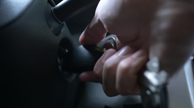 Close-up of a hand starting a car engine with a key, revving the motor several times and then turning it off, with realistic ignition and engine sounds