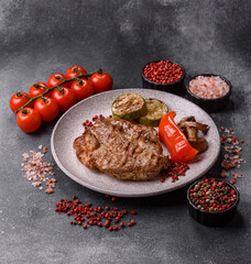 Grilled beef or pork steak, healthy restaurant food for lunch. Barbecue steak as a background