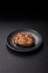 Grilled beef or pork steak, healthy restaurant food for lunch. Barbecue steak as a background