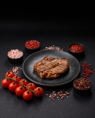 Grilled beef or pork steak, healthy restaurant food for lunch. Barbecue steak as a background