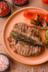 Grilled beef or pork steak, healthy restaurant food for lunch. Barbecue steak as a background