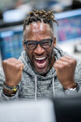 Celebrating a successful trading day in a busy financial office environment