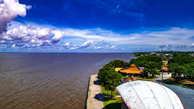 Riverside City Landscape Amazon River Mouth Macap&aacute; Amapa Seaside North Amazonian Waterfront Boats Scenic Fluvial Landscape Coast Brazil Nature Travel Tourism Regional Culture Navigation South America