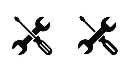 Two crossed tool icons a screwdriver wrench and a wrench screwdriver