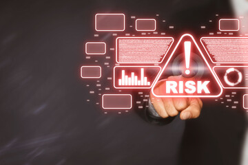 Businessman touching warning sign with word Risk and data on virtual screen, closeup