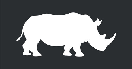 Bold White Silhouette of a Rhinoceros: Powerful Wildlife Icon on Dark Background for Graphic Design and Conservation Projects