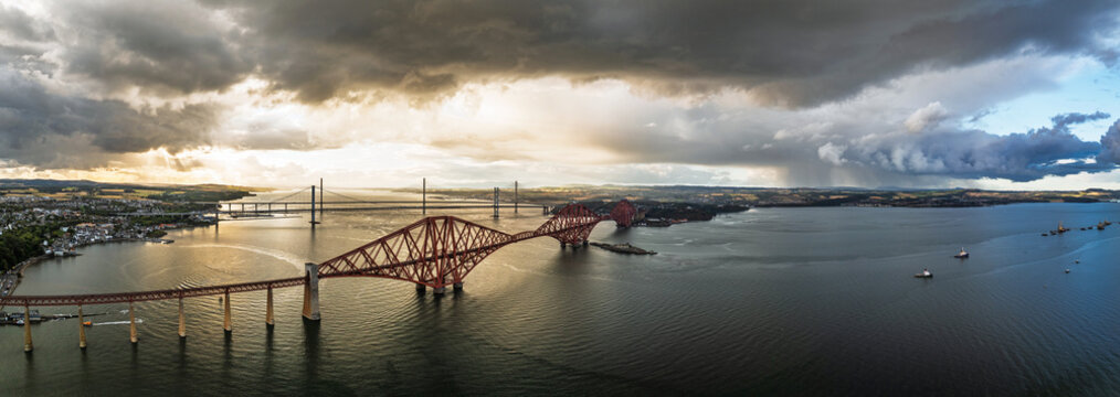 Forth Bridge from a drone, Queensferry Crossing, Forth Estuary, Scotland
