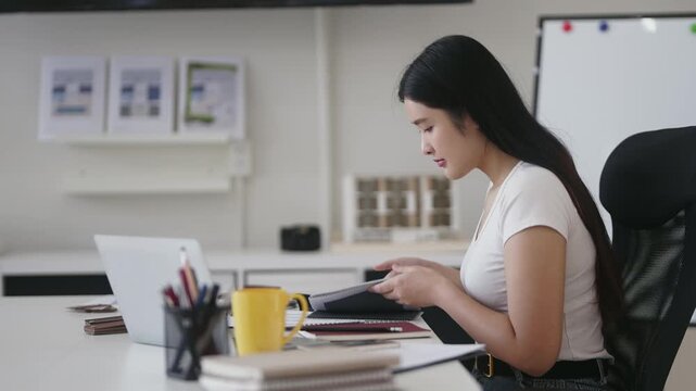 Interior designer working with patterns and colors in office