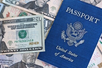 US passport with USA dollars money bills, American citizen in United States of America concept