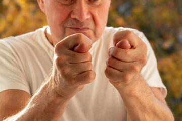 gesture fig, Angry Aggressive Stressed senior man, visual person experiencing intense frustration, Confrontation and conflict, stress, life pressures, Mental health issues, Workplace frustration
