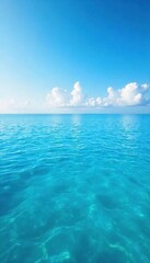 Serene Ocean Horizon Calm Waters Reflecting a Brilliant Blue Sky - Perfect Peaceful Background for Travel, Nature, and Website Design