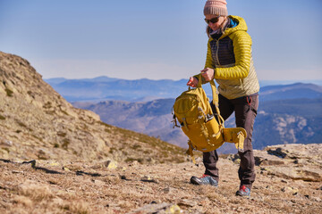 Woman walking alone in the mountains