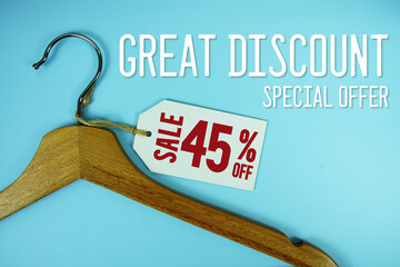 Great Discount Sale 45% off price tag label with Clothes hanger Clothing Promotion shopping concept