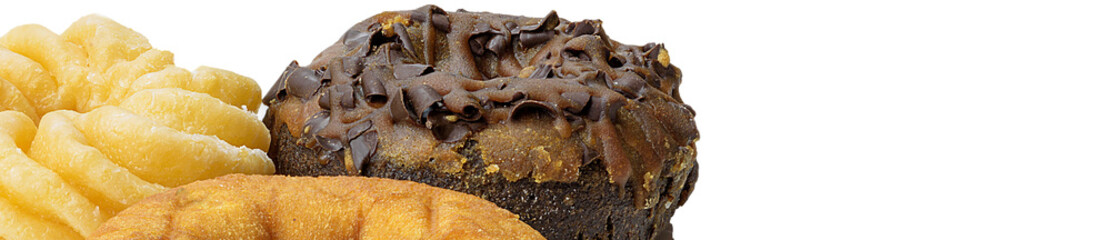 Close-up of several donuts on a 5.5 MPx white background  with copy space right side.