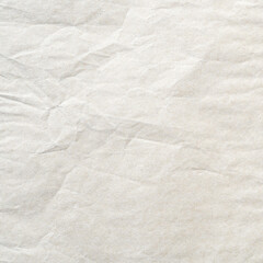 Crumpled old beige parchment paper texture