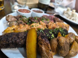 High angle view of freshly roasted garlic flavor potatoes