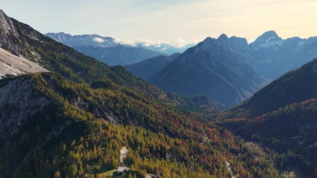 Aerial scenic drone flight over the Julian Alps near Vrsic Pass, the highest mountain pass in Slovenia, Europe