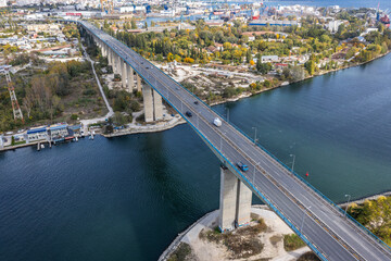 Aerial view of big bridge with cars above lake towards Varna, Bulgaria