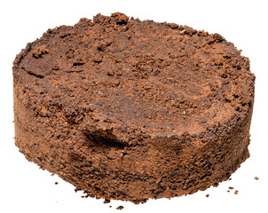 Pressed tablet of used ground coffee, coffee puck or cake