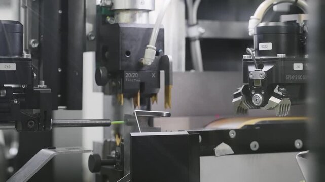 Detailed view of advanced automated crimp machinery operating in a cable production facility