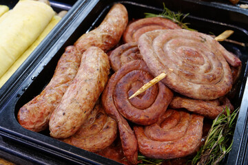 Meat sausages and frankfurters in street fast food restaurant