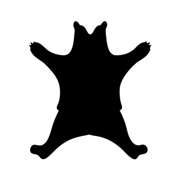 Vector art of silhouette of a bear skin rug, a symbol of hunting or trophy, representing a bears hide used as decoration