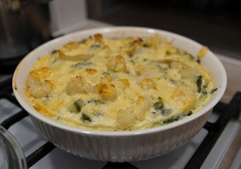 Noodle Casserole with Cheese, Sauce, and Spinach