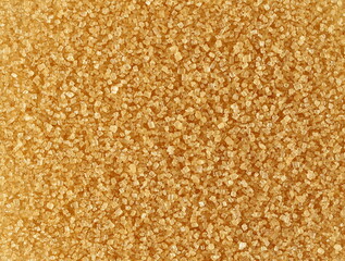 pile brown granulated sugar background and texture, sugarcane