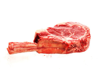 Premium fresh uncooked tomahawk steak on the bone on white background. High quality and top price cow meat product with unique taste and flavor.