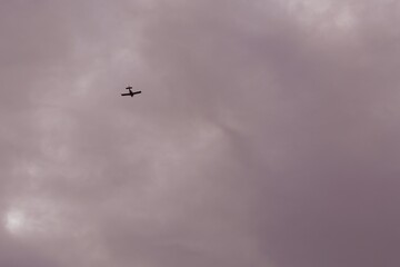 Airplane flying in the sky. Ideal for travel backgrounds